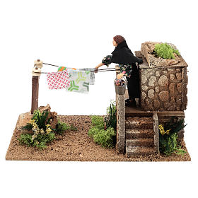 Woman hanging the wash, 12 cm moving nativity