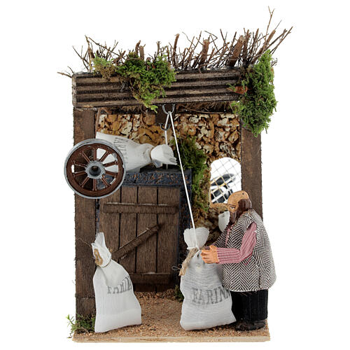 Shepherd with bags of flour, animated 8 cm Neapolitan nativity 1