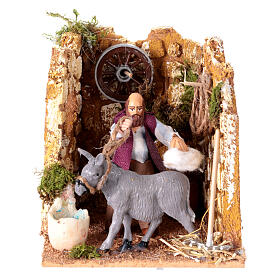 Moving figurine for Neapolitan Nativity scene, man currying donkey 8 cm