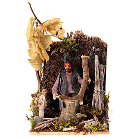 Man cuts wood for Neapolitan Nativity scene of 8 cm
