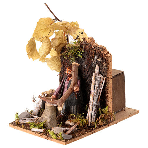 Man cuts wood for Neapolitan Nativity scene of 8 cm 3