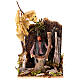 Man cuts wood for Neapolitan Nativity scene of 8 cm s1