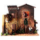 Nativity scene setting, house with 2 moving women 40x45x35 cm s1