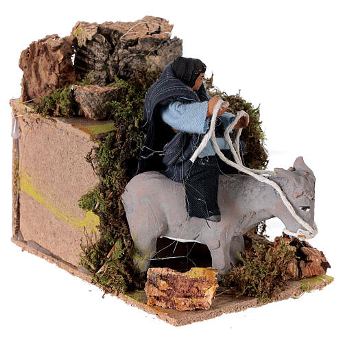 Boy riding a donkey, animated nativity figure 10 cm 3