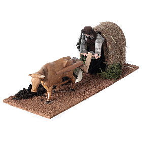 Farmer with ox in motion for Nativity Scene with 12 cm characters 10x10x30 cm