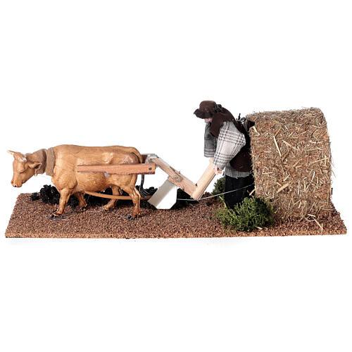 Farmer with ox in motion for Nativity Scene with 12 cm characters 10x10x30 cm 1