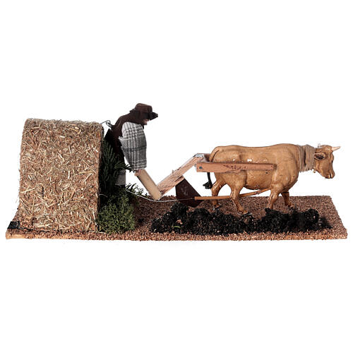 Farmer with ox in motion for Nativity Scene with 12 cm characters 10x10x30 cm 4