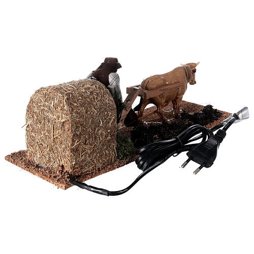 Farmer with ox in motion for Nativity Scene with 12 cm characters 10x10x30 cm 5