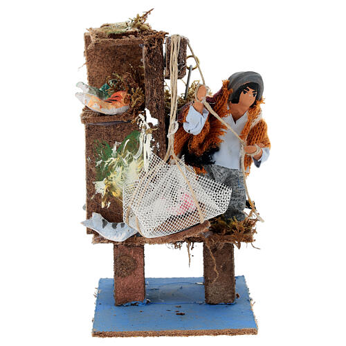 Pêcheur avec filet mouvement pour crèche 12 cm 1