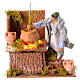 Donna con polenta in movimento con led 10x15x10 cm presepe 12 cm s5
