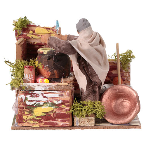 Kobieta przygotowująca polentę w ruchu, z oświetleniem LED, 10x15x10 cm, do szopek 12 cm 1