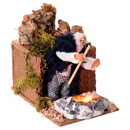 Hombre calentándose las manos belén 8 cm movimiento 10x15x10 cm 3