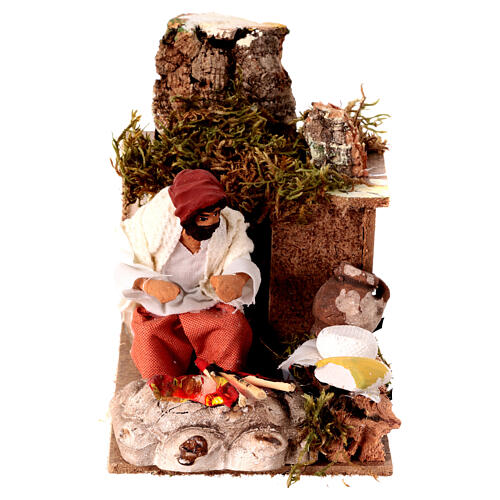 Uomo che si scalda le mani presepe 8 cm movimento 10x15x10 cm 1