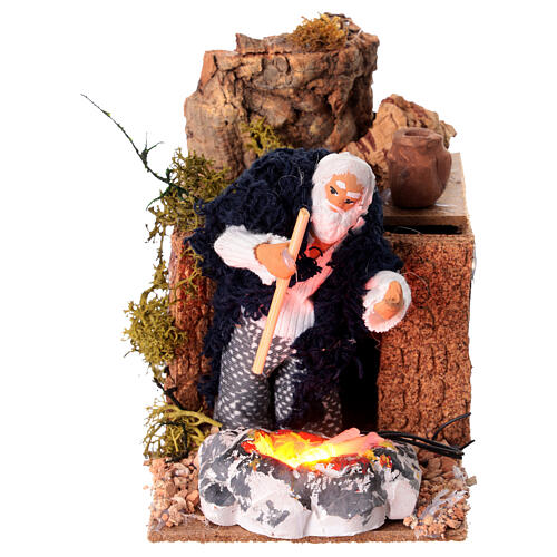 Homem aquecendo as mãos em movimento 10x15x10 cm para presépio com figuras de 8 cm 1