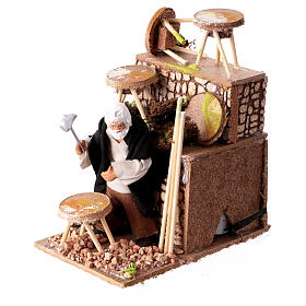Animated scene with man building stools for 10 cm Nativity Scene, 20x15x10 cm