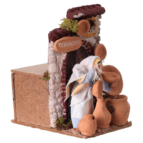 Terracotta vendor with motion for 10 cm Nativity Scene, 10x10x15 cm 3