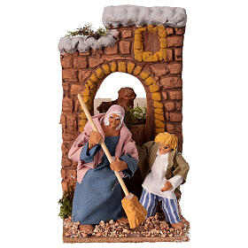 Woman sweeping animated nativity scene 10x15x15 cm, 10 cm terracotta