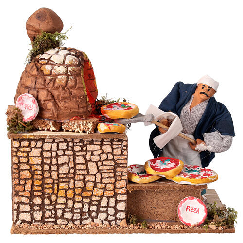 Hombre cocinando pizza en movimiento horno iluminado 20x20x12 belén 15 cm terracota 1