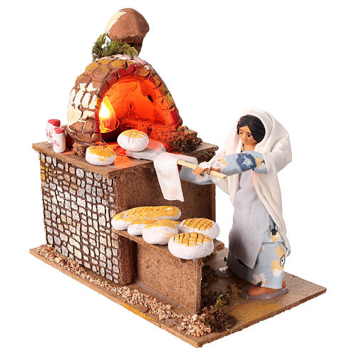 Baker in motion with illuminated oven for 15 cm Nativity Scene, 18x12x20 cm 2