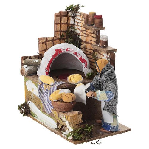 Fornaia presepe 10 cm 15x14x9 cm in movimento 2