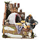Fornaia presepe 10 cm 15x14x9 cm in movimento s1