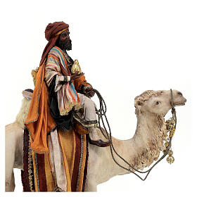 Roi Mage noir avec vase sur chameau 18cm Tripi