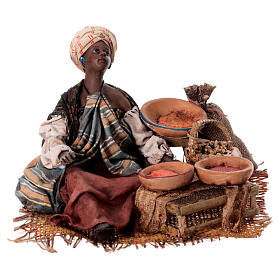 Sitting Moor Woman with sacks 18cm Angela Tripi