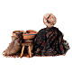Sitting Moor Woman with sacks 18cm Angela Tripi s6