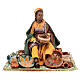 Femme maure assise avec vaisselle 18 cm Angela Tripi s1