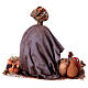 Ciemnoskóra kobieta siedząca z ceramiką 18 cm Angela Tripi s7
