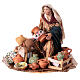 Mujer sentada con objetos de cerámica 13 cm Angela Tripi s1