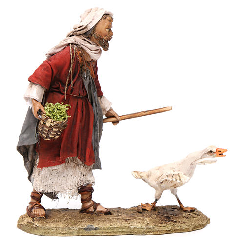 Nativity scene figurine, shepherd chasing after a goose, 13 cm made by Angela Tripi 1