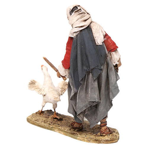 Nativity scene figurine, shepherd chasing after a goose, 13 cm made by Angela Tripi 5