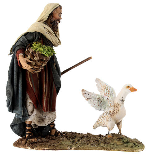 Nativity scene figurine, shepherd chasing after a goose, 13 cm made by Angela Tripi 1