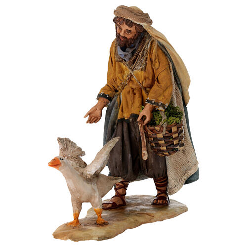 Nativity scene figurine, shepherd chasing after a goose, 13 cm made by Angela Tripi 1