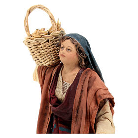 Mulher com cestas de semente 13 cm presépio Angela Tripi