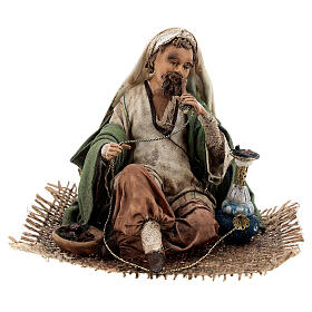 Man smoking narghile 13cm, Nativity Scene by Angela Tripi