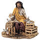 Sitting man with doves 13cm, Nativity Scene by Angela Tripi s1