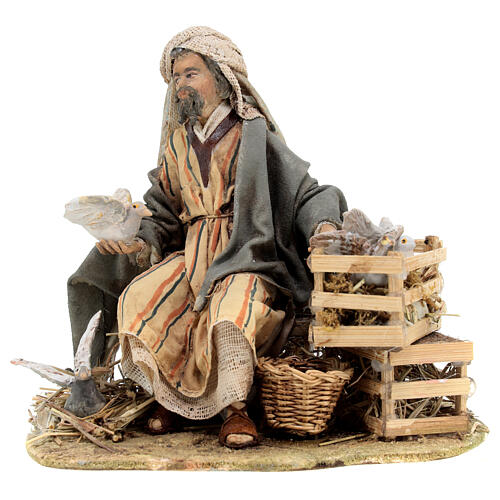 Sitting man with doves 13cm, Nativity Scene by Angela Tripi 1
