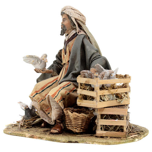 Sitting man with doves 13cm, Nativity Scene by Angela Tripi 3