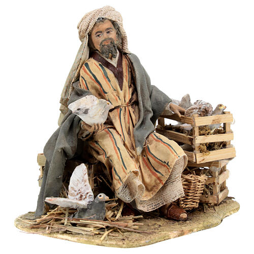 Sitting man with doves 13cm, Nativity Scene by Angela Tripi 4