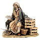 Sitting man with doves 13cm, Nativity Scene by Angela Tripi s1
