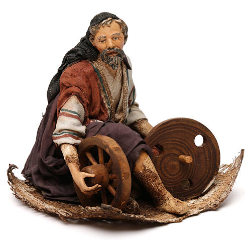 Shepherd sitting with wheel, 18 cm by Angela Tripi 4