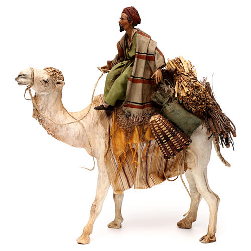 Camelo com homem sobre as costas dele para presépio Angela Tripi altura média 18 cm 1