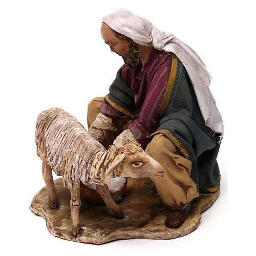 Man milking goat for 13 cm Nativity scene, Angela Tripi 2