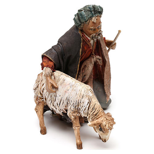 Kneeling shepherd with sheep grazing, 13 cm Angela Tripi 5