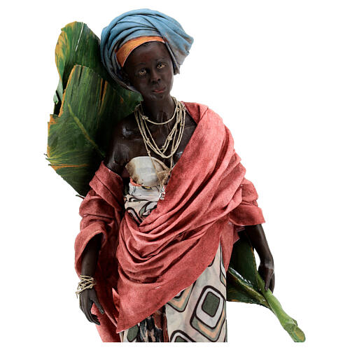 Mujer con hojas de plátano 30 cm belén Tripi 2