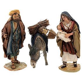 Família de pastores com criança e burro para Presépio de Natal de Angela Tripi com figuras de altura média 13 cm