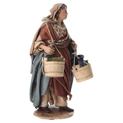 Woman carrying jug and vegetables, 13 Angela Tripi 2