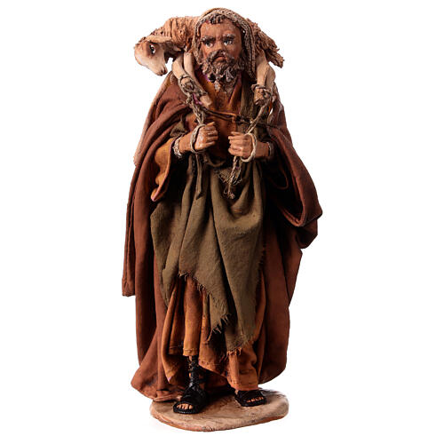 Nativity scene figurine, Shepherd carrying a sheep by Angela Tripi 13 cm 1
